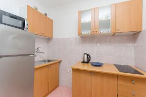 Kuchyň nebo kuchyňský kout v ubytování Apartments Danica + 7 fotografií
