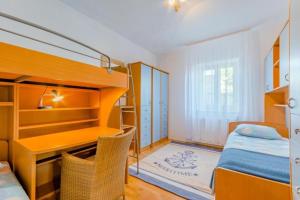 Posteľ alebo postele v izbe v ubytovaní Apartment Panorama