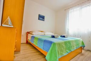 Postel nebo postele na pokoji v ubytování Apartment Lenka Mato