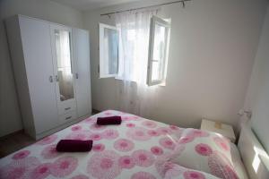Postel nebo postele na pokoji v ubytování Apartment Lenka Mato