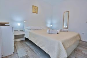 Postel nebo postele na pokoji v ubytování Apartment Lenka Mato