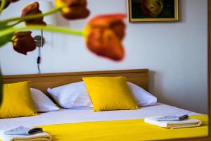 Postel nebo postele na pokoji v ubytování Apartments ZB