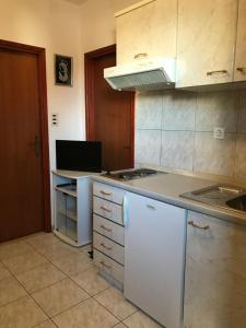 Η κουζίνα ή μικρή κουζίνα στο Apartment Tonci +20 φωτογραφίες