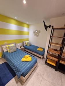 Postel nebo postele na pokoji v ubytování Casa Rosso Blu + 36 fotografií