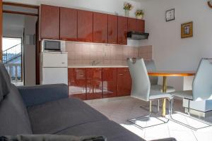 Kuchyň nebo kuchyňský kout v ubytování Apartments Daira