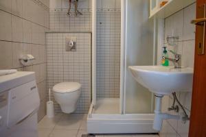 Koupelna v ubytování Apartments Daira