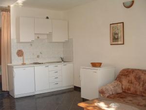 Kuchyňa alebo kuchynka v ubytovaní Apartments Tonka