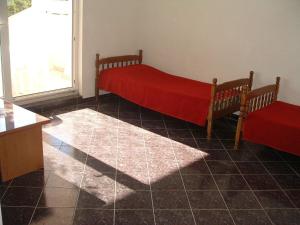Posteľ alebo postele v izbe v ubytovaní Apartments Tonka