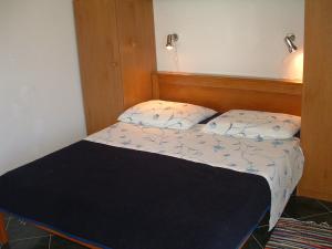 Posteľ alebo postele v izbe v ubytovaní Apartments Tonka