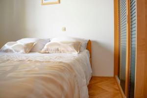 Postel nebo postele na pokoji v ubytování Apartments Daira
