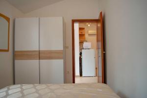 Postel nebo postele na pokoji v ubytování Apartments Daira