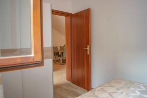 Postel nebo postele na pokoji v ubytování Apartments Daira