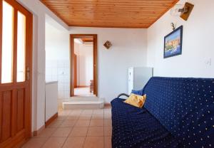Televízia a/alebo spoločenská miestnosť v ubytovaní Apartment Ante M