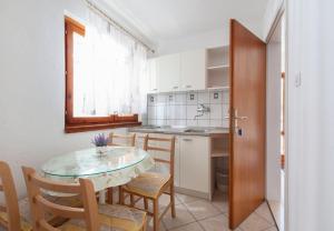 Kuchyň nebo kuchyňský kout v ubytování Apartment Ante M
