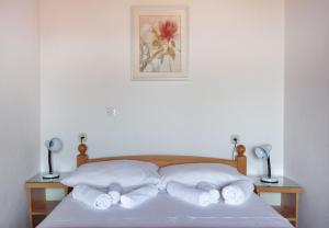 Postel nebo postele na pokoji v ubytování Apartment Ante M