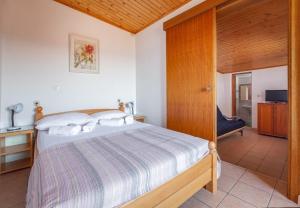Postel nebo postele na pokoji v ubytování Apartment Ante M