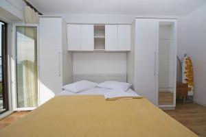 Posteľ alebo postele v izbe v ubytovaní Apartment Panorama