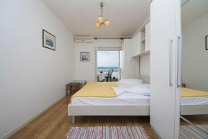 Posteľ alebo postele v izbe v ubytovaní Apartment Panorama