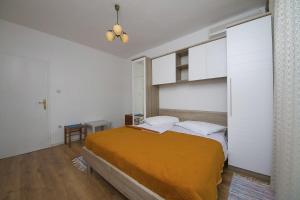 Posteľ alebo postele v izbe v ubytovaní Apartment Panorama