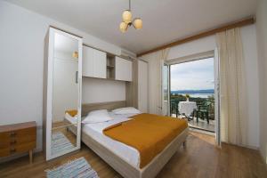 Posteľ alebo postele v izbe v ubytovaní Apartment Panorama