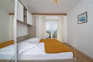 Posteľ alebo postele v izbe v ubytovaní Apartment Panorama