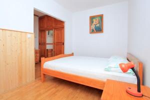 Posteľ alebo postele v izbe v ubytovaní Apartment Jakica