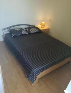 Postel nebo postele na pokoji v ubytování Apartment Kova