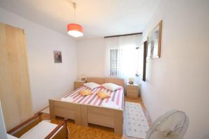 Posteľ alebo postele v izbe v ubytovaní Rooms Smilje