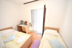 Posteľ alebo postele v izbe v ubytovaní Rooms Smilje