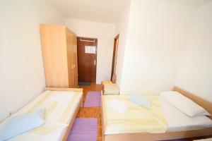 Posteľ alebo postele v izbe v ubytovaní Rooms Smilje