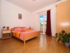 Posteľ alebo postele v izbe v ubytovaní Apartments Zar