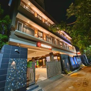 a building with a gate in front of it at night at M S RESIDENCY in Chennai