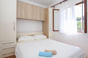Postel nebo postele na pokoji v ubytování House Villa Bistrana