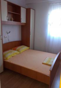Postel nebo postele na pokoji v ubytování Apartment Slaven