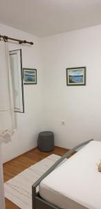 Posteľ alebo postele v izbe v ubytovaní Apartment Natad