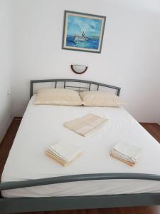 Posteľ alebo postele v izbe v ubytovaní Apartment Natad
