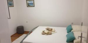 Posteľ alebo postele v izbe v ubytovaní Apartment Natad