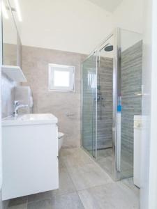 Kúpeľňa v ubytovaní Apartments Petar
