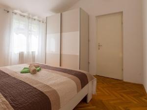 Posteľ alebo postele v izbe v ubytovaní Apartments Petar