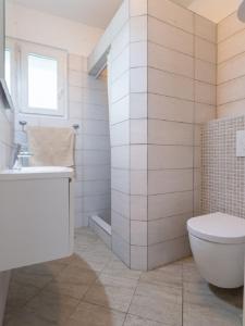 Kúpeľňa v ubytovaní Apartments Petar