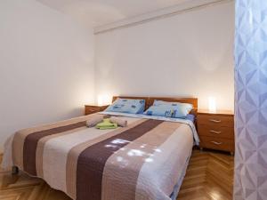 Posteľ alebo postele v izbe v ubytovaní Apartments Petar