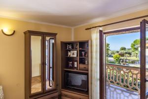 TV a/nebo společenská místnost v ubytování Apartments Mir