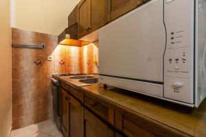 Kuchyň nebo kuchyňský kout v ubytování Apartments Mir