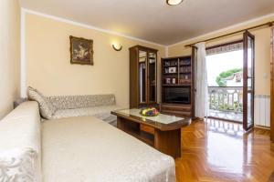Postel nebo postele na pokoji v ubytování Apartments Mir