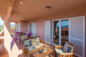 Et opholdsområde på Apartments Tomica