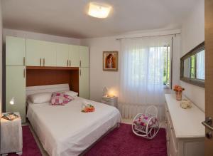 Postel nebo postele na pokoji v ubytování House Lucmar + 32 fotografií