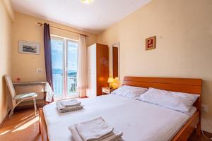Postel nebo postele na pokoji v ubytování Apartment Mir