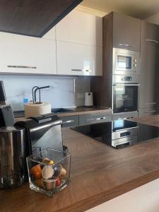 Kuchyň nebo kuchyňský kout v ubytování Apartments Ita 1