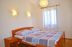 Postel nebo postele na pokoji v ubytování House Mary