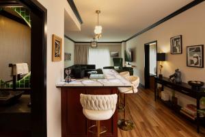a kitchen and living room with a bar in a room at The Swiftwater in Swiftwater